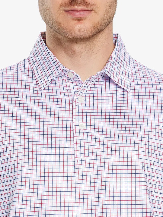 Model wears a WHITE GRID  golf polo shirt, which emphasizes its cut and comfort when viewed from nose to chest