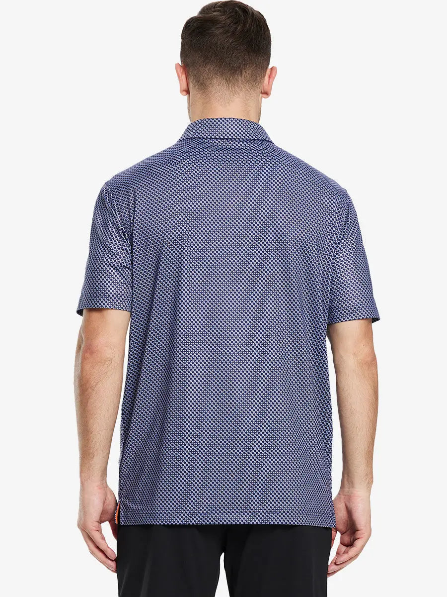 Modeled in a navy blue chevron style polo shirt, the back view shows a clean and modern design for classic golf style.