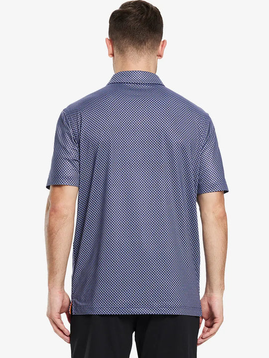 Modeled in a navy blue chevron style polo shirt, the back view shows a clean and modern design for classic golf style.