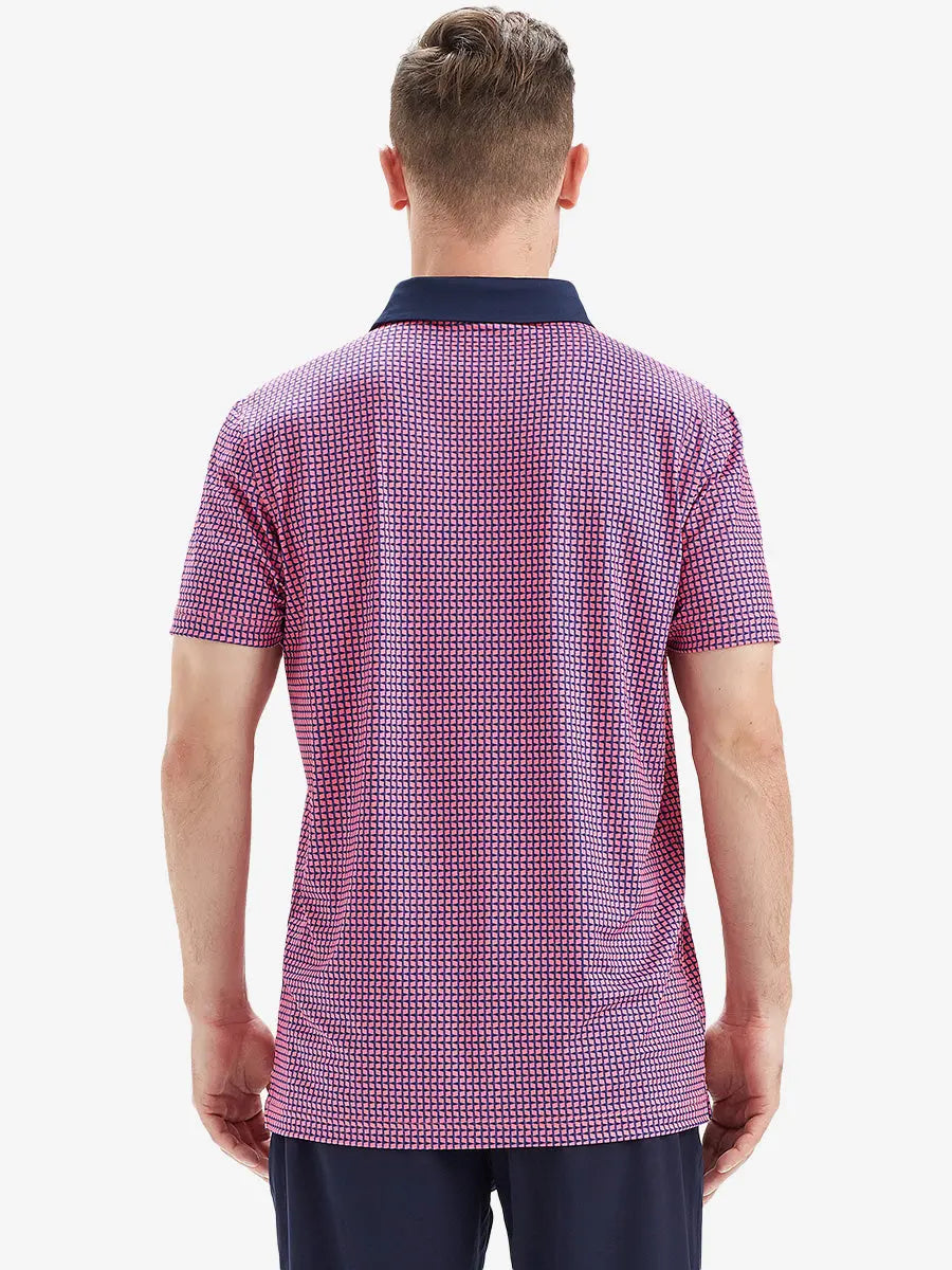 From the back, the model shows the back design of the SORBET FLAGPOLE Polo shirt, clearly showing the shape and cut of the garment