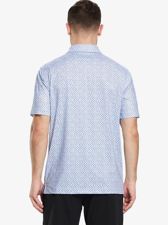 Back half-body view of model in BLUE LOOP CHAIN Performance Quick Dry Print Golf Polo.