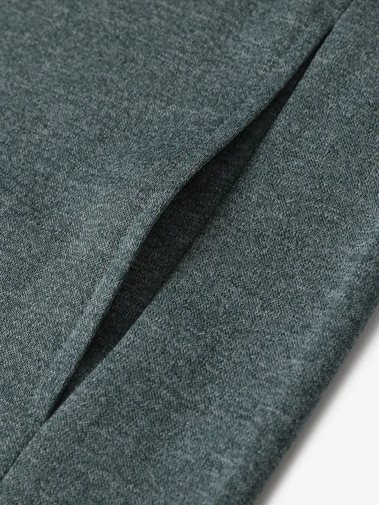 Right pocket detail of Green Heather hoodie showing functional design and cozy finish